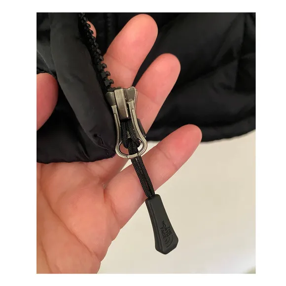 Black North Face 550 Zip Up Puffer Jacket