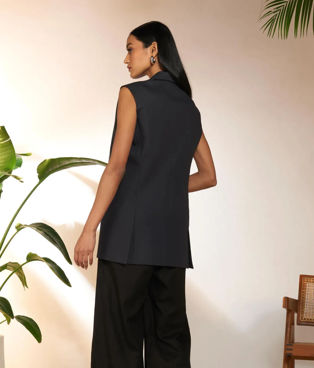 Black tropicool sleeveless blazer and bustier