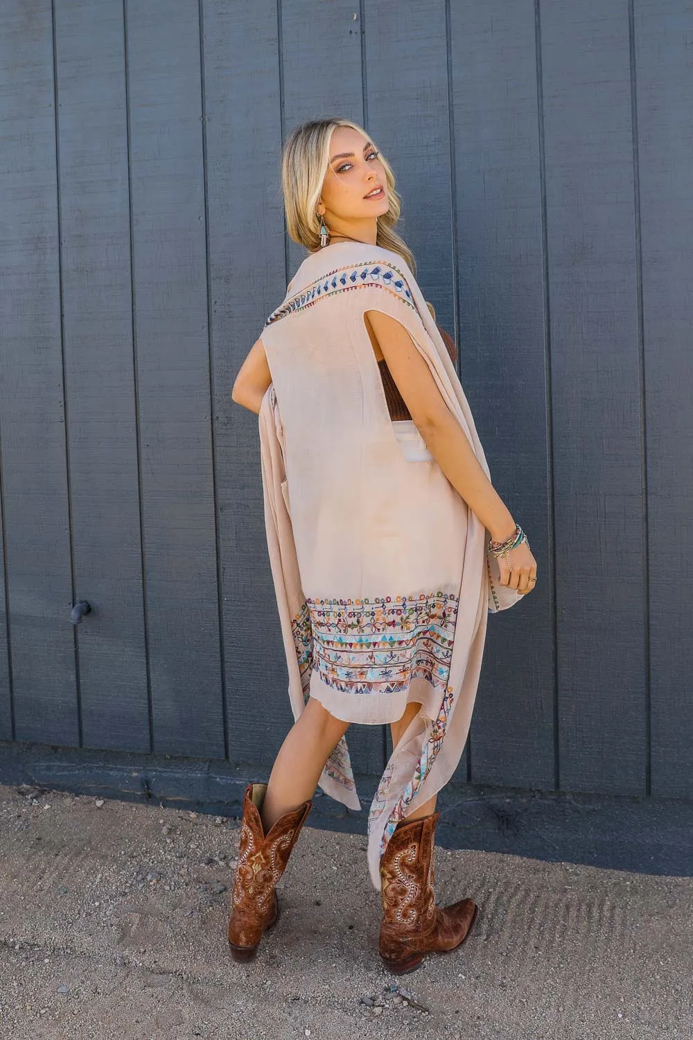 Geometric Embroidered Sleeveless Kimonos.