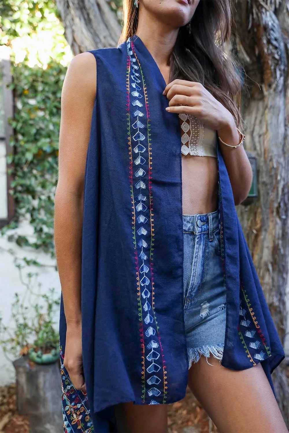 Geometric Embroidered Sleeveless Kimonos.