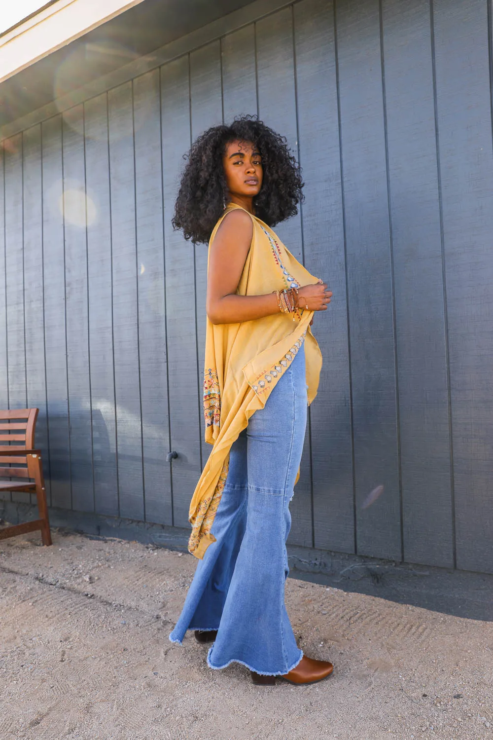 Geometric Embroidered Sleeveless Kimonos.