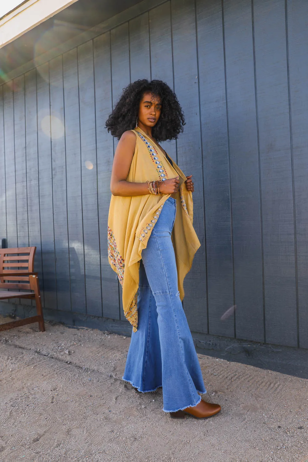 Geometric Embroidered Sleeveless Kimonos.