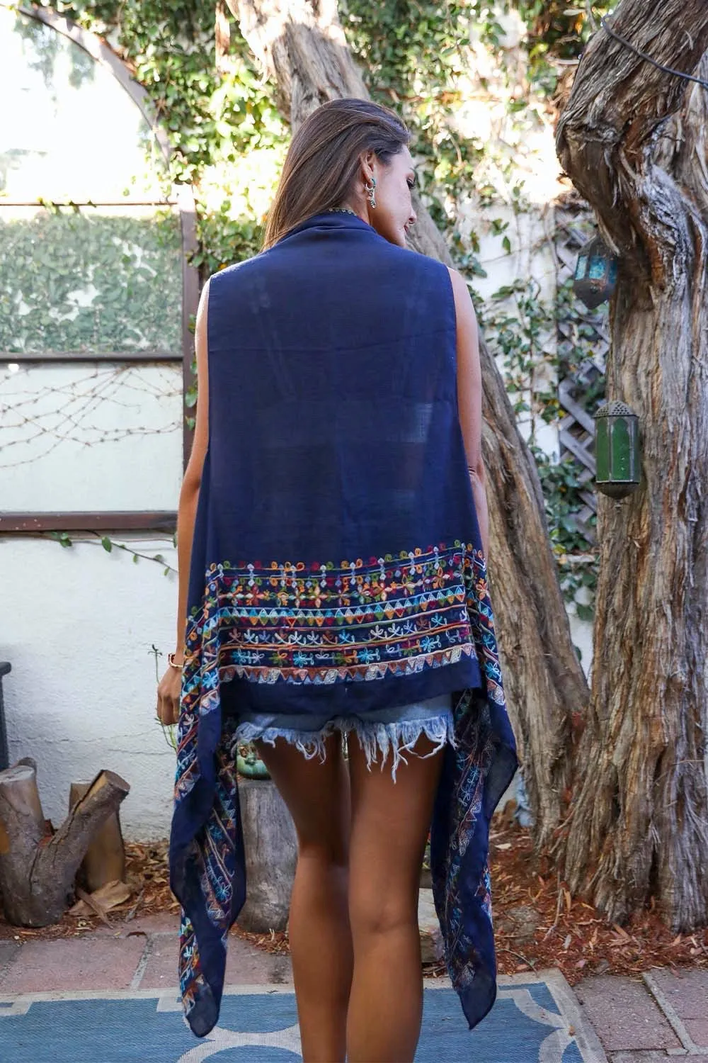 Geometric Embroidered Sleeveless Kimonos.